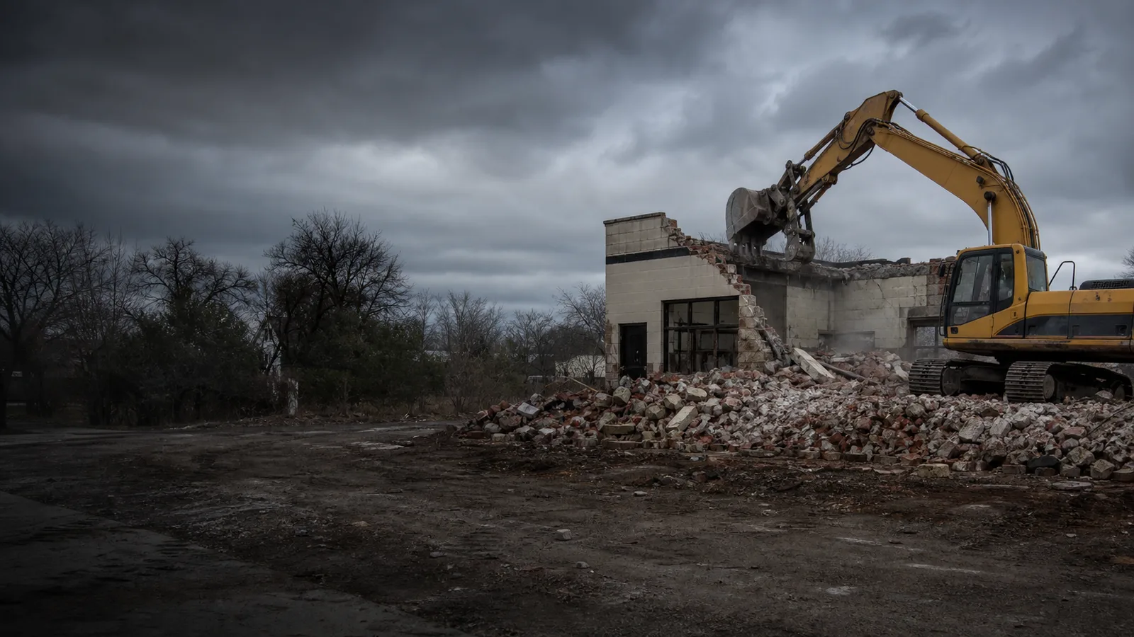 Demolition equipment working at a cleared Southeast Michigan property